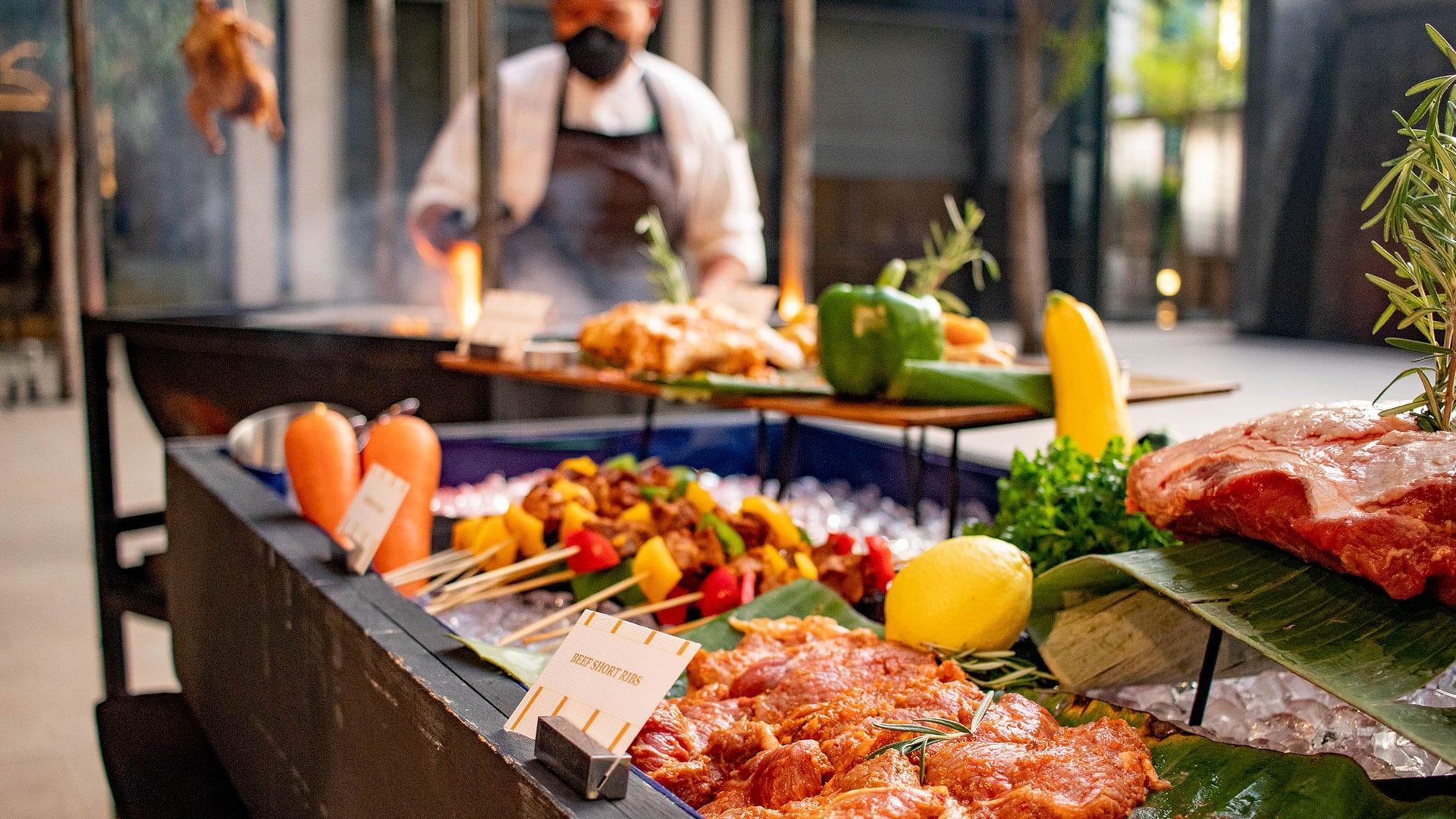Chef Action Shot - Seafood Extravaganza Buffet Dinner