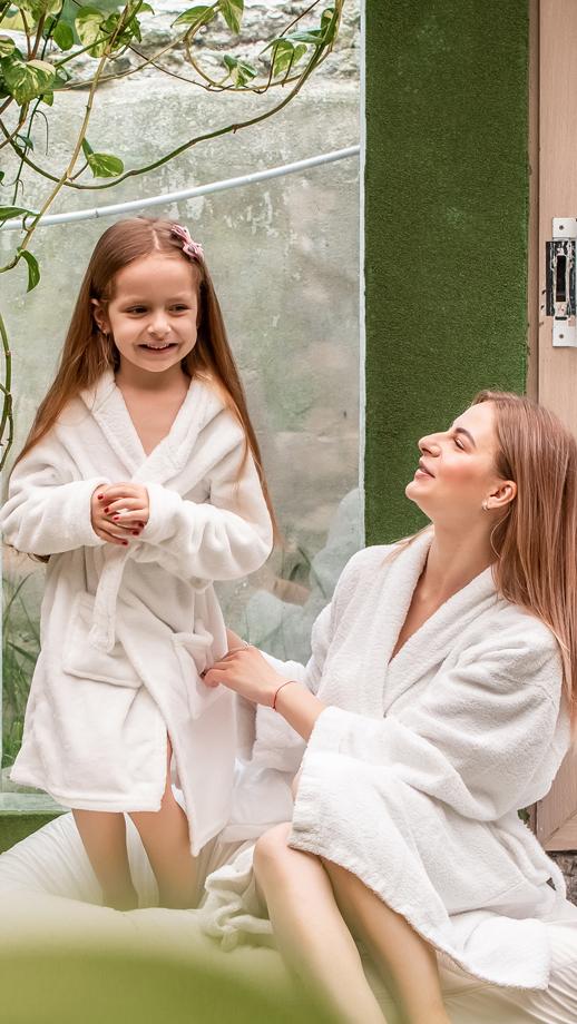 Mother and daughter relaxing at the spa