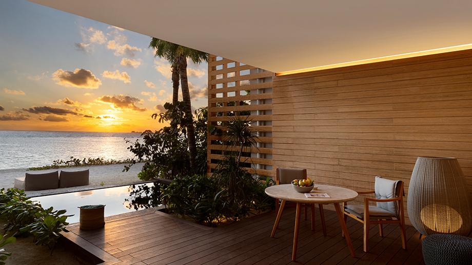 beachfront terrace pool suite terrace at sunset