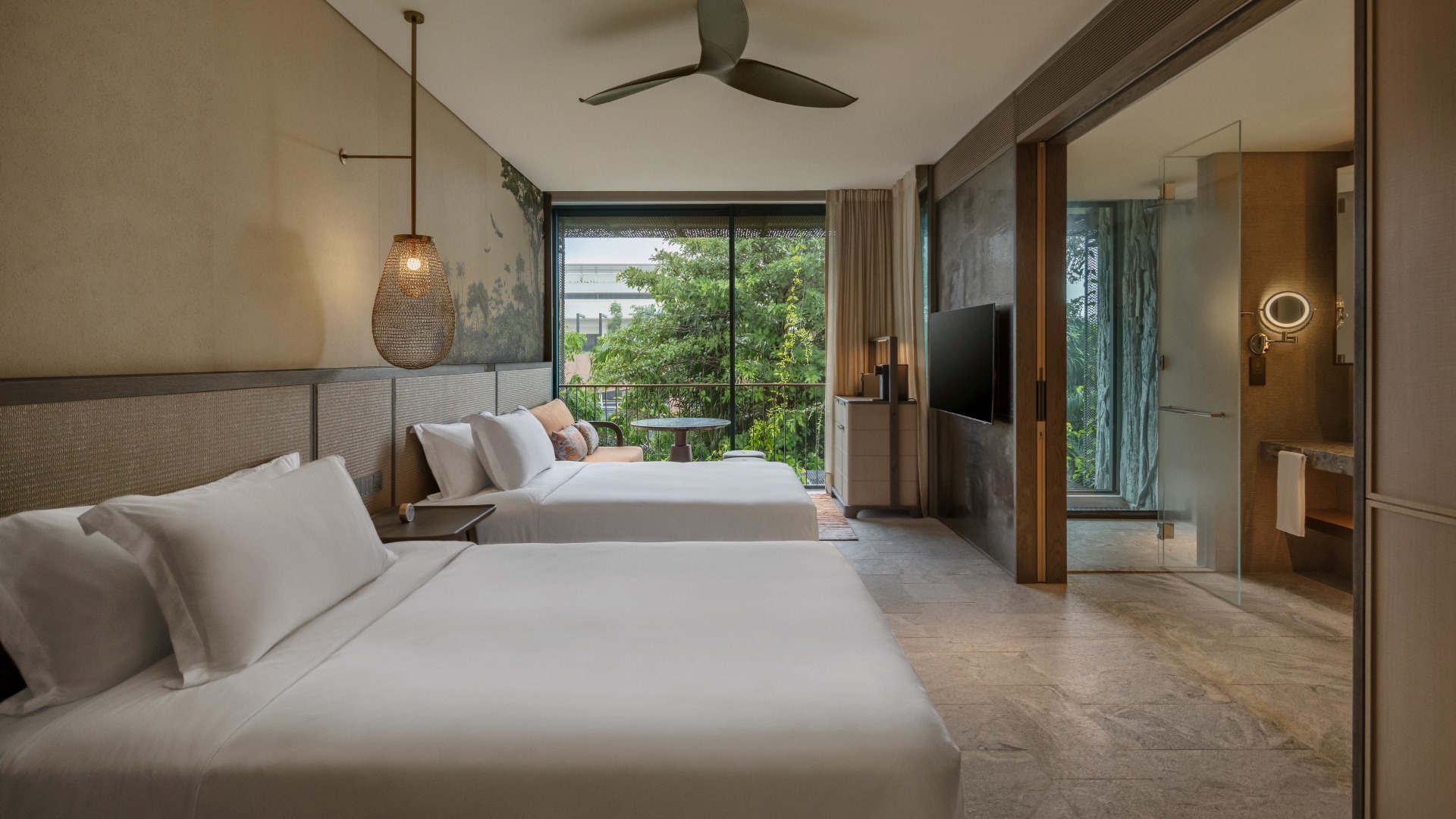 Enjoy serene views of the garden and immerse in the tranquility of the nature in the Retreat Double Double room.