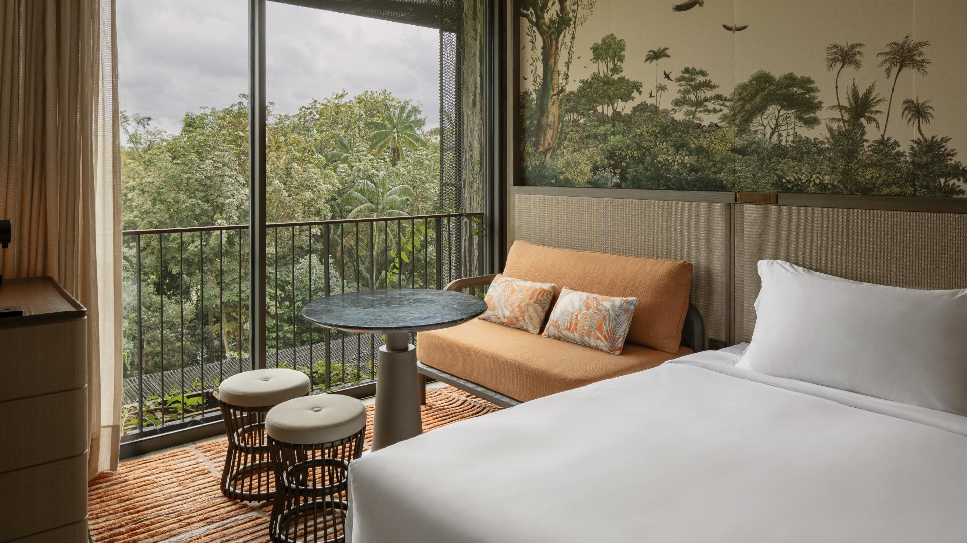 Rainforest room with two double size beds, overlook lush greenery at Mandai Rainforest Resort by Banyan Tree.