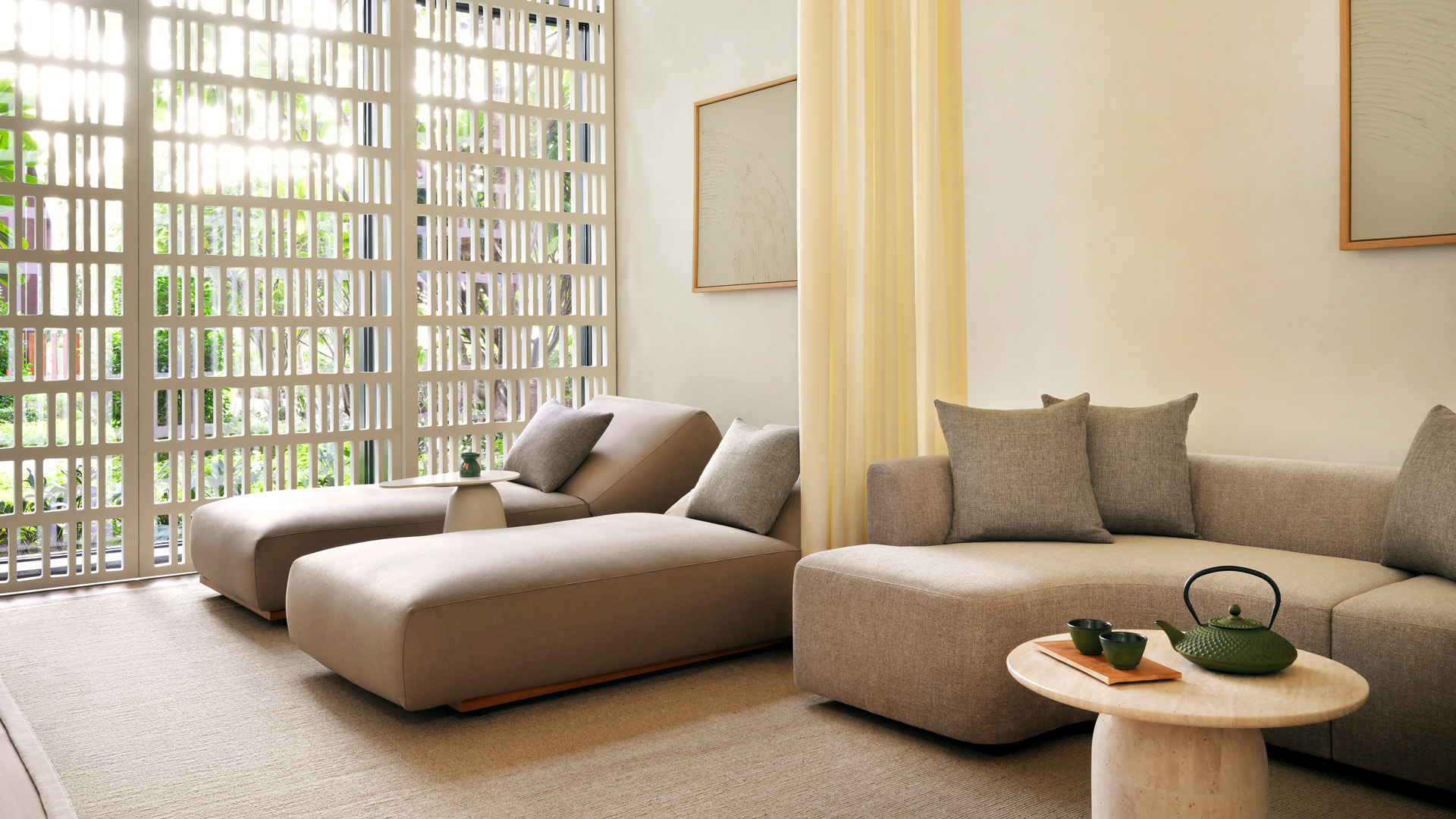 Tranquil spa relaxation lounge at Banyan Tree Dubai featuring plush beige loungers, soft natural lighting, and a serene tea setup — ideal for pre- and post-treatment unwinding in a luxury wellness setting.