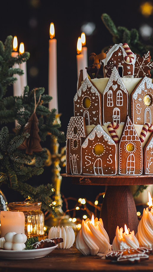 A candlelit festive gingerbread house