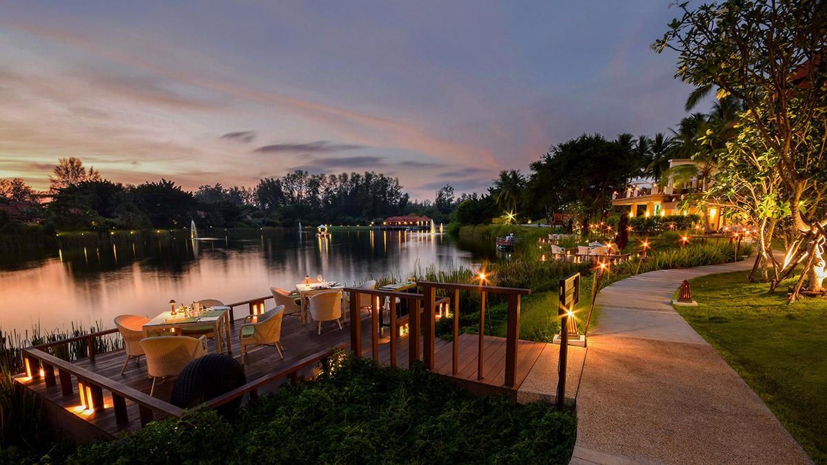 Banyan Tree Thailand Phuket Dining - The Water Court Exterior Evening Sunset Deck